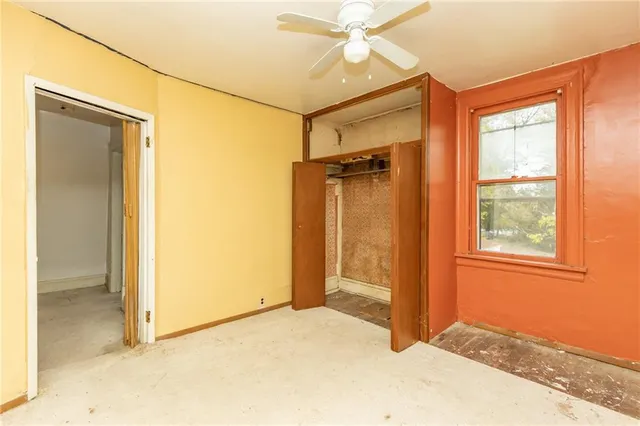 a view of a room with a hallway