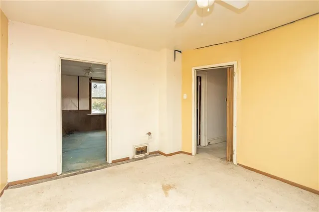 a view of entryway with wooden walls