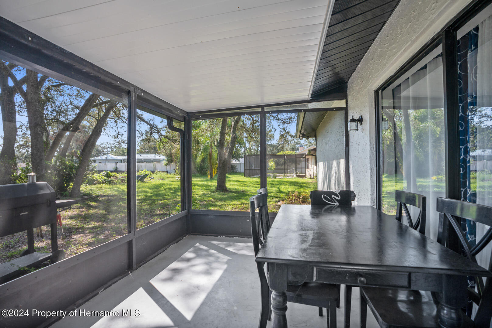 2004 Nobleton Avenue Spring Hill, FL 34608 - Photo 27 of 38 a view of a dining room and furniture window and outside view