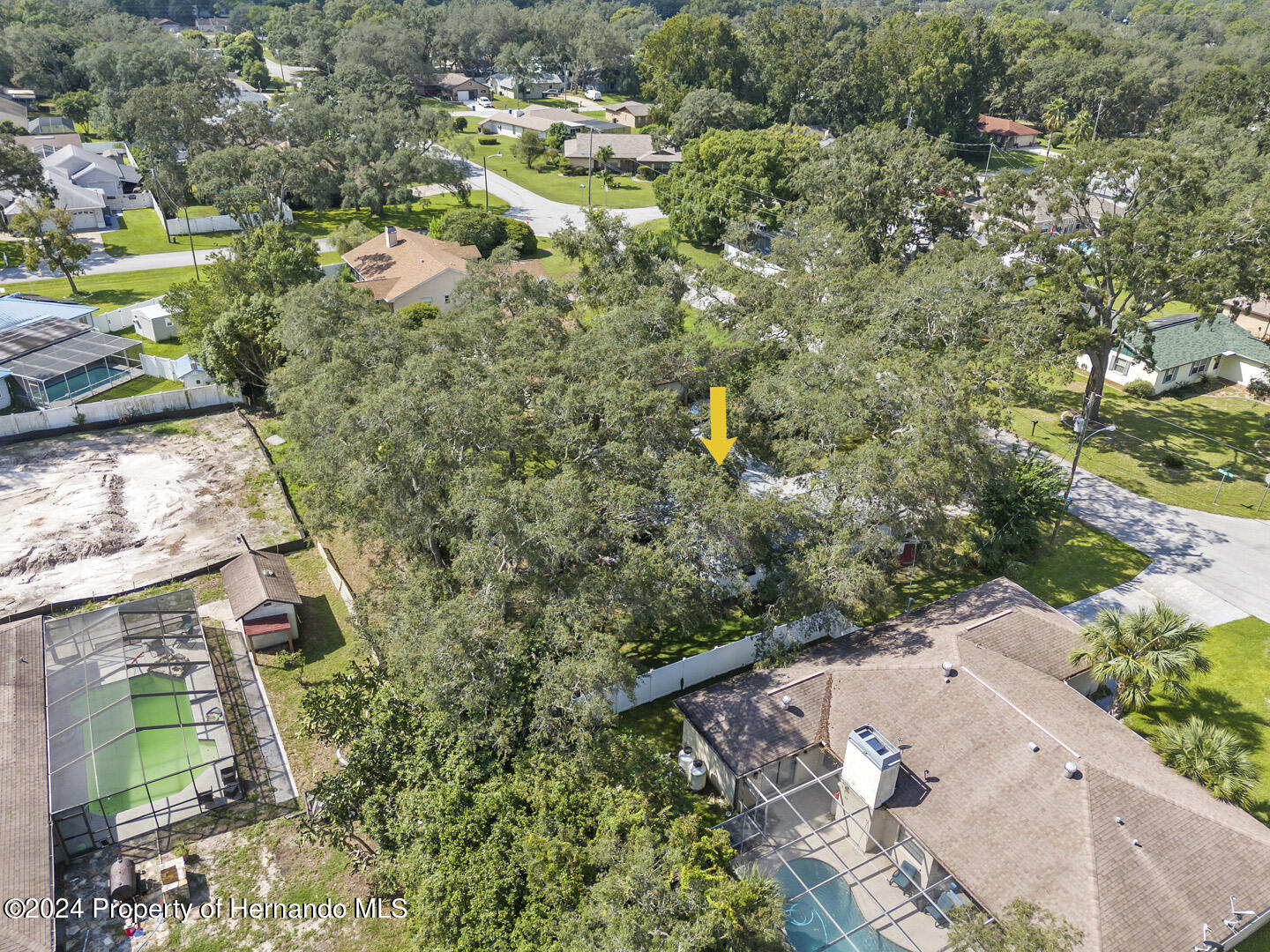 2004 Nobleton Avenue Spring Hill, FL 34608 - Photo 36 of 38 an aerial view of a house with a yard