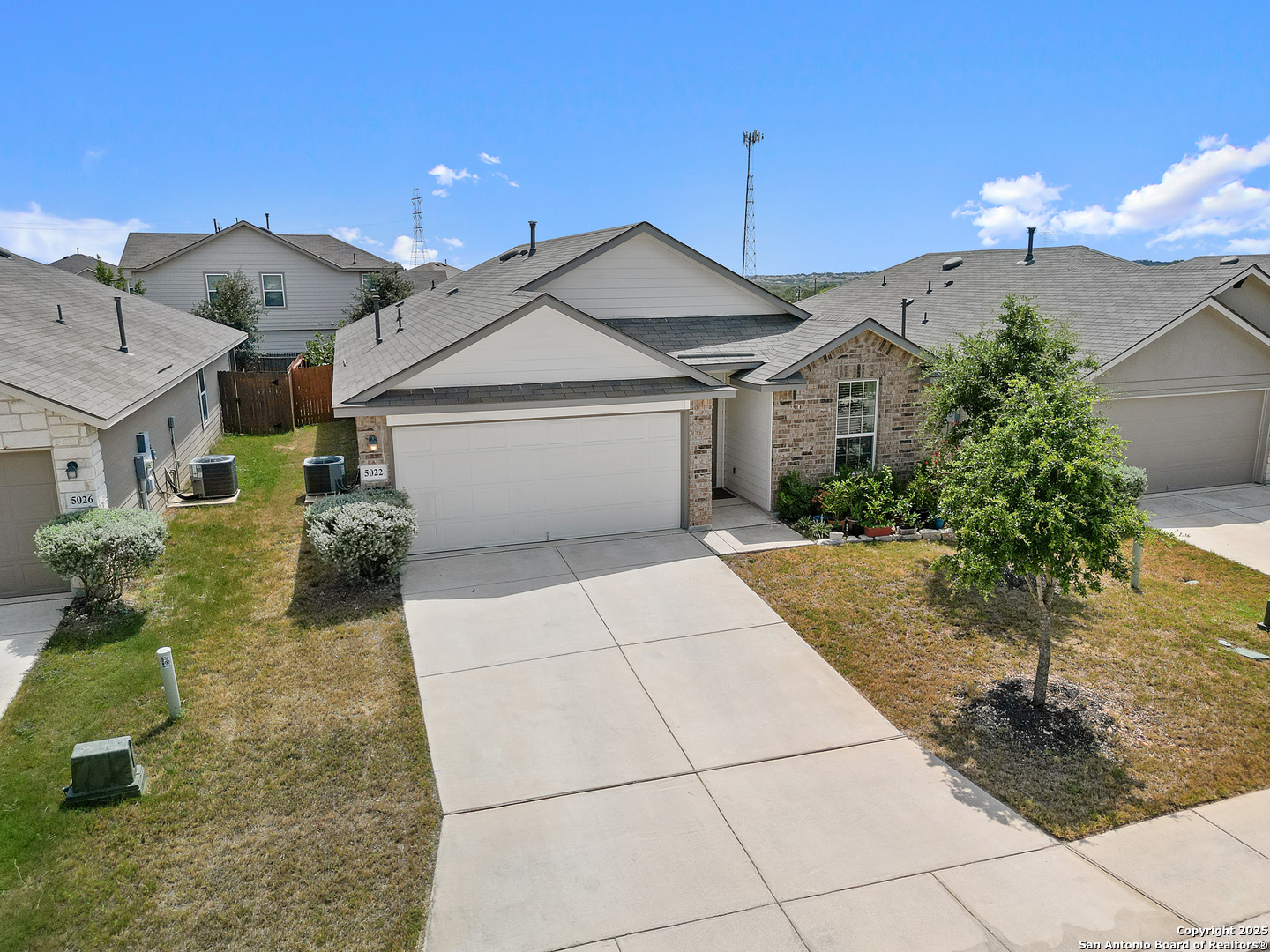 5022 Dancing Gopher San Antonio, TX 78261 - Photo 27 of 36 a view of a house with a yard and potted plants