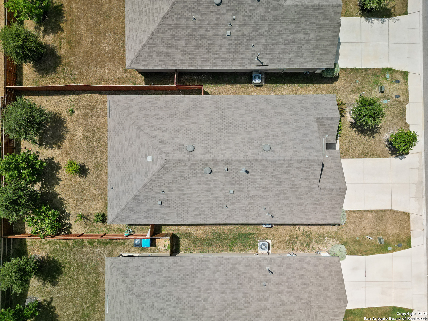 5022 Dancing Gopher San Antonio, TX 78261 - Photo 28 of 36 an aerial view of a house with a yard