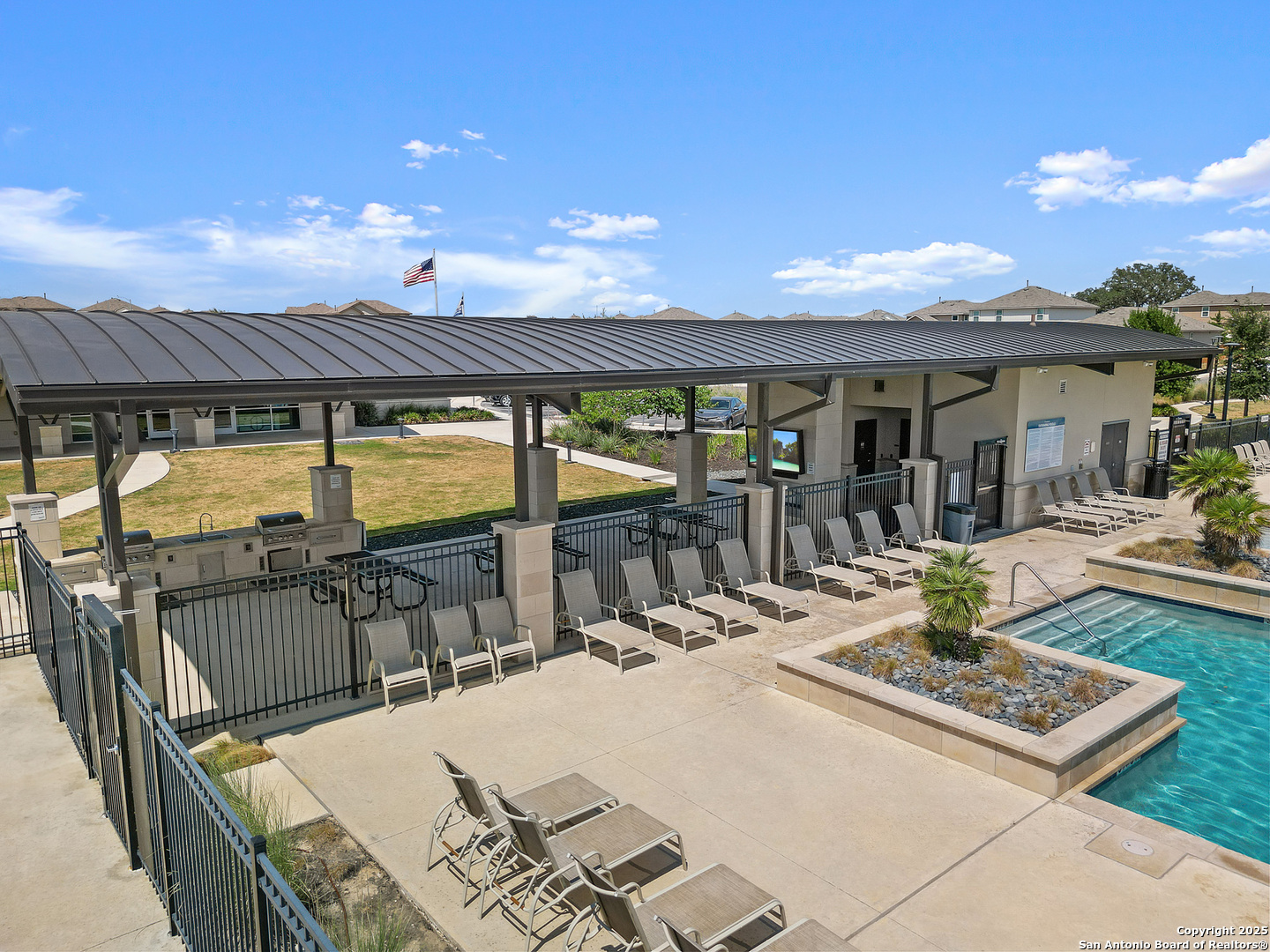 5022 Dancing Gopher San Antonio, TX 78261 - Photo 35 of 36 a view of a patio with a dining table and chairs with wooden floor