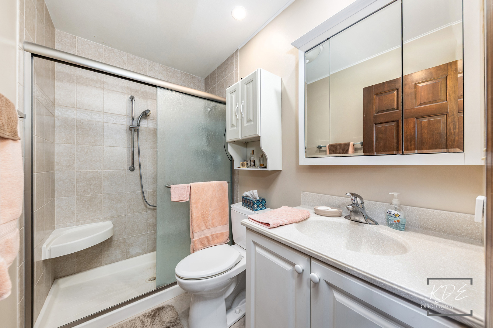 923 Tim Tam Circle Naperville, IL 60540 - Photo 14 of 28 a bathroom with a sink toilet and shower