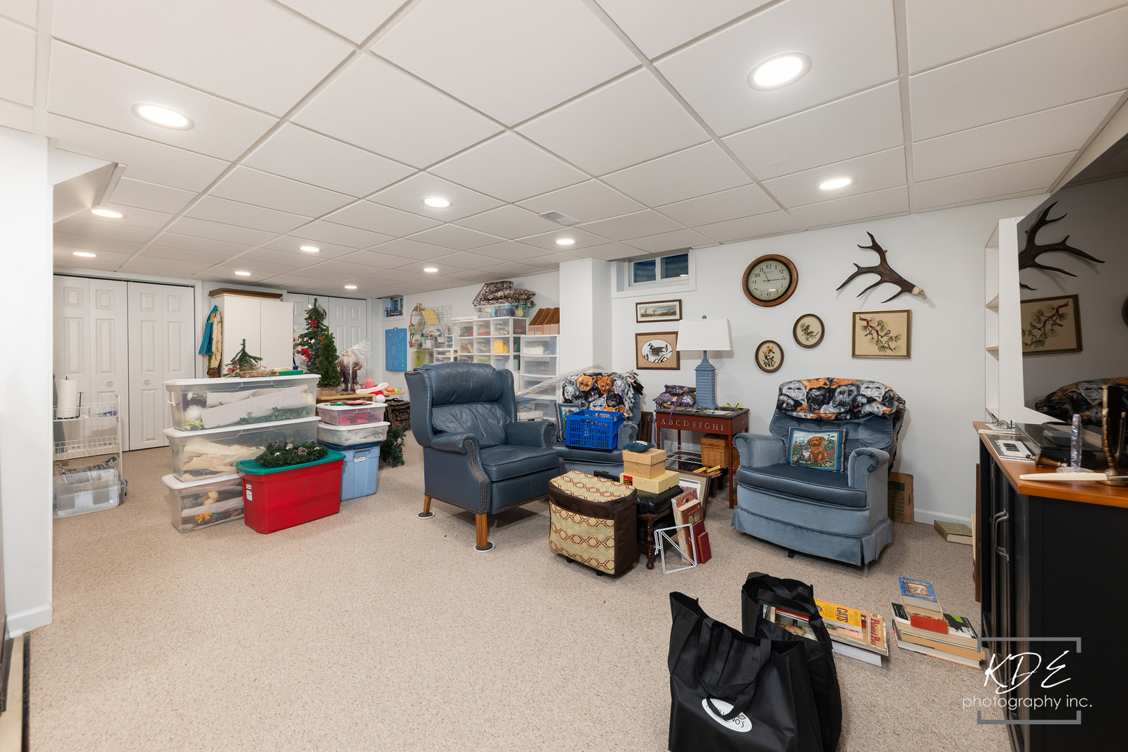 923 Tim Tam Circle Naperville, IL 60540 - Photo 22 of 28 a living room with lots of furniture and a flat screen tv