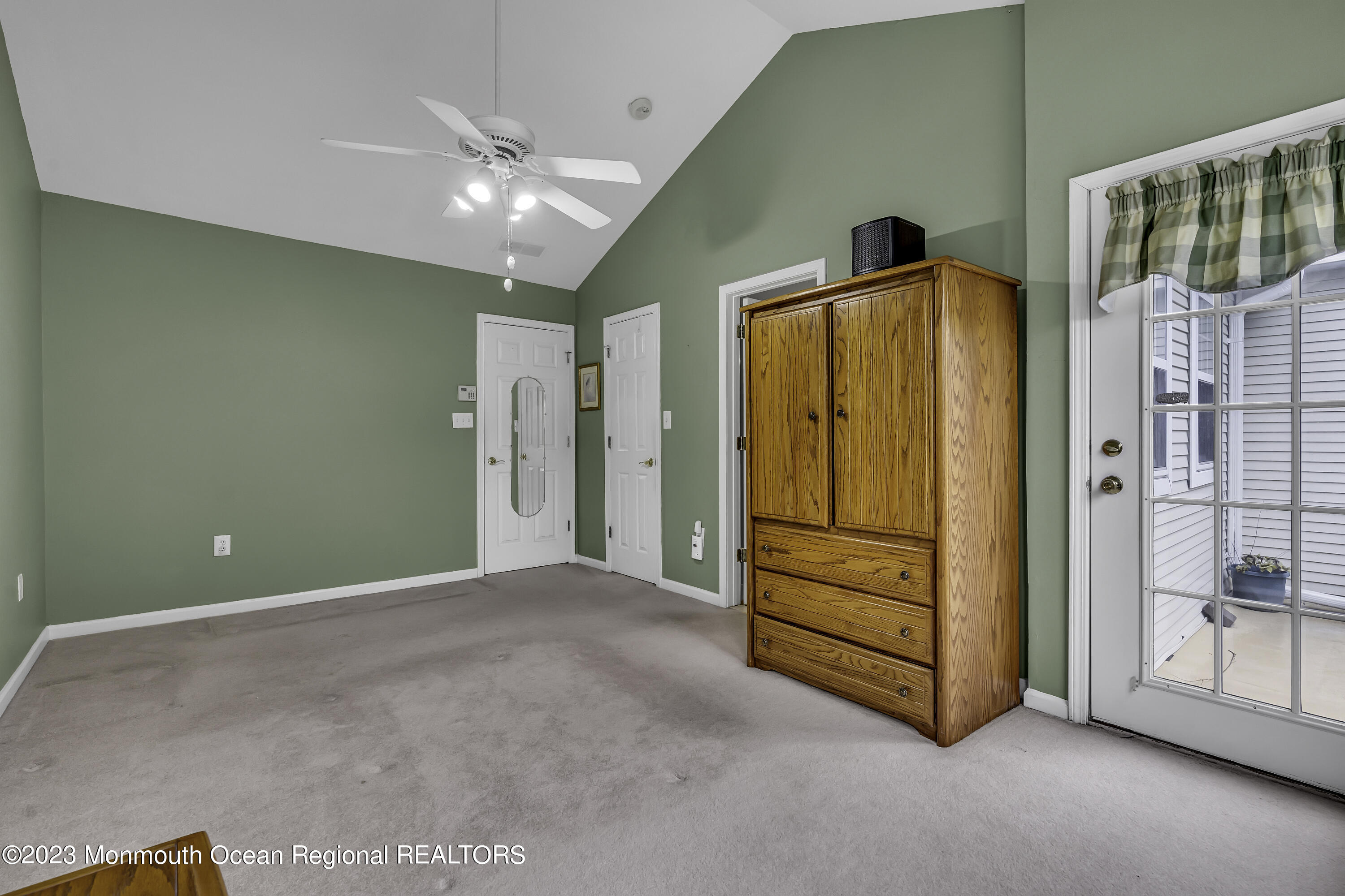 8 Alpine Road, Unit 197 Holmdel, NJ 07733 - Photo 14 of 18 a view of an empty room with cabinet and stairs