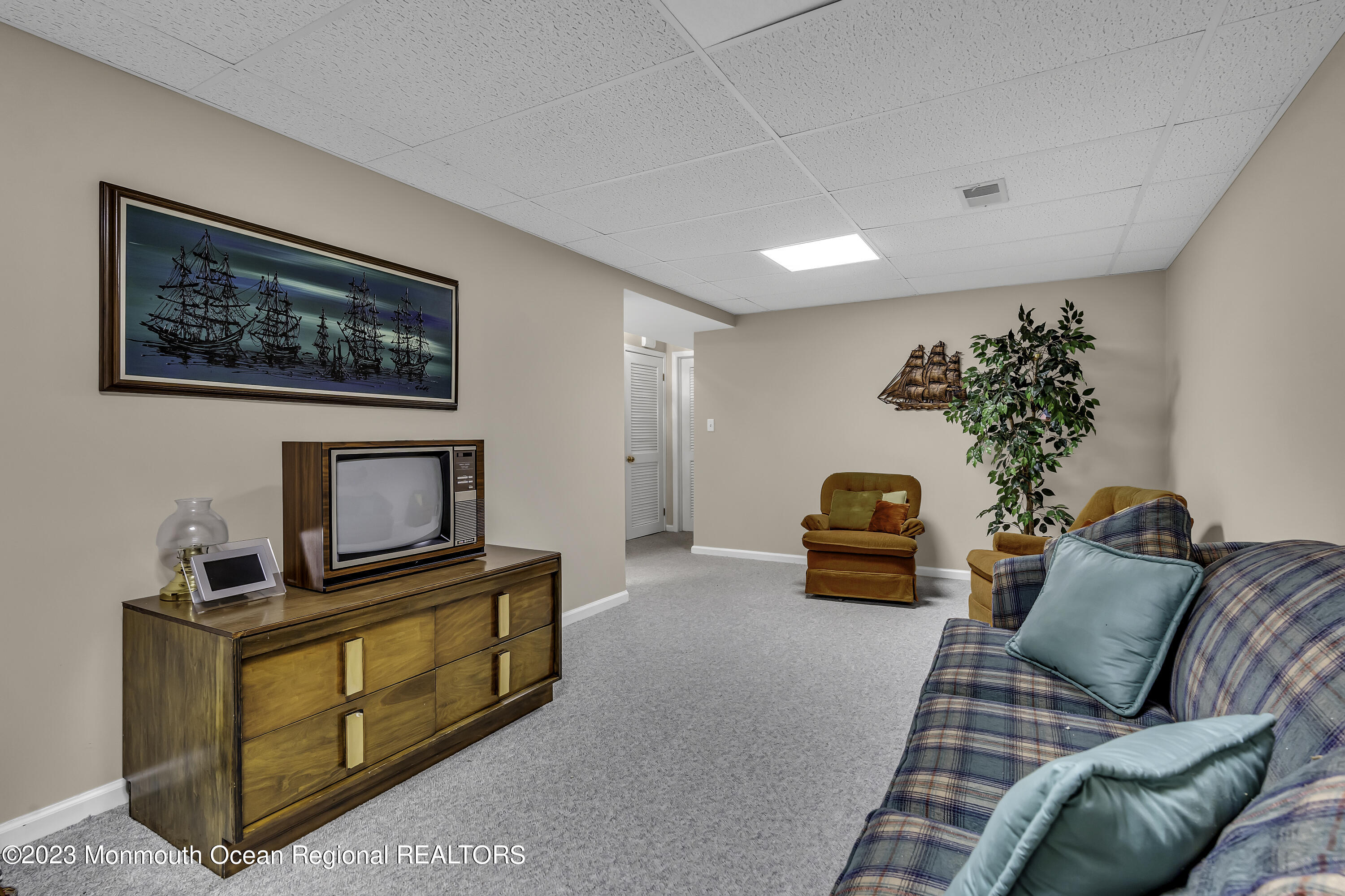 8 Alpine Road, Unit 197 Holmdel, NJ 07733 - Photo 17 of 18 a living room with furniture