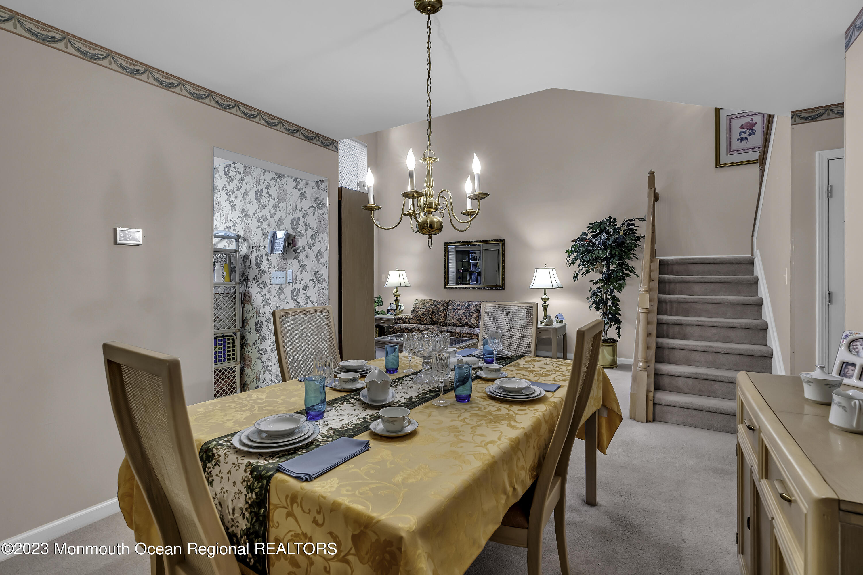 8 Alpine Road, Unit 197 Holmdel, NJ 07733 - Photo 5 of 18 a view of a dining room with furniture