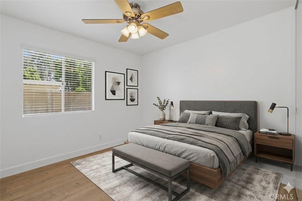 11 Fairside Irvine, CA 92614 - Photo 21 of 40 a bedroom with bed and a window