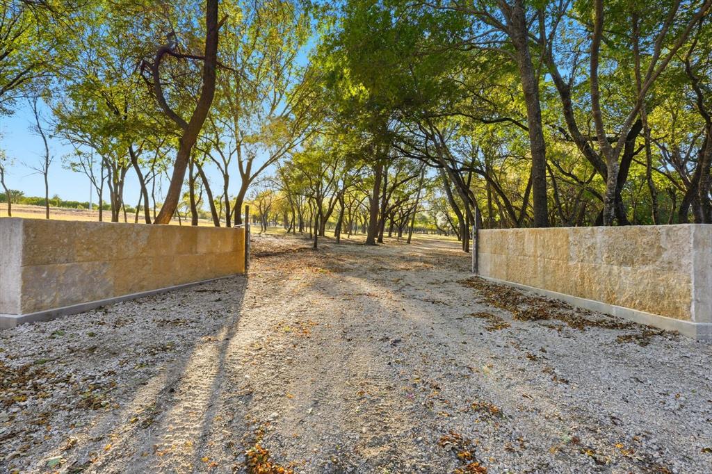 2401 Bear Creek Road Aledo, TX 76008 - Photo 5 of 37 View of dirt / gravel driveway