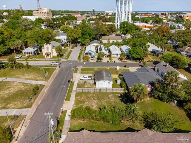 an aerial view of a house with a garden