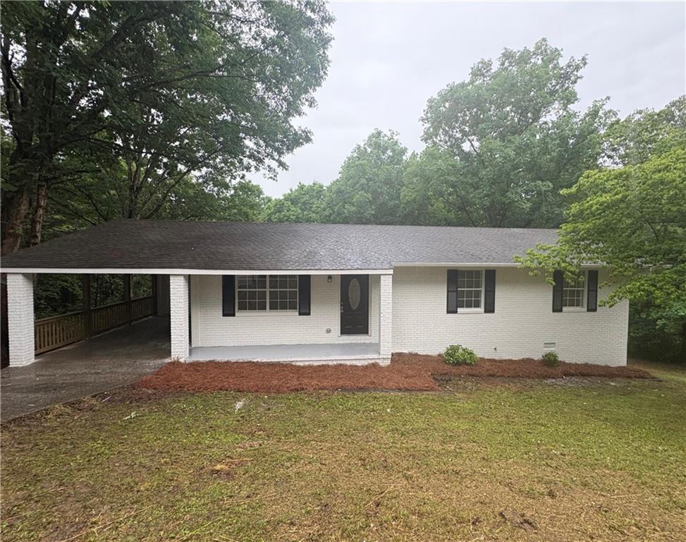 643 Akins Road Chickamauga, GA 30707 - Photo 1 of 14 a house view with a backyard space