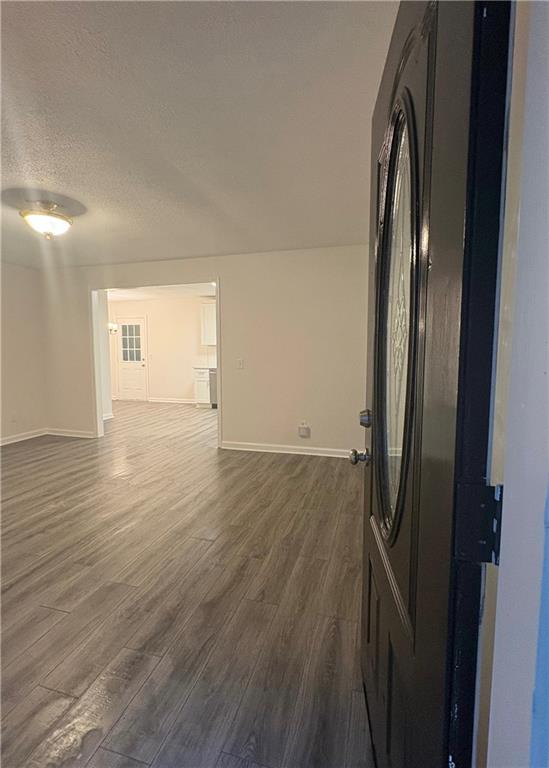 643 Akins Road Chickamauga, GA 30707 - Photo 3 of 14 a view of a room with wooden floor and a window