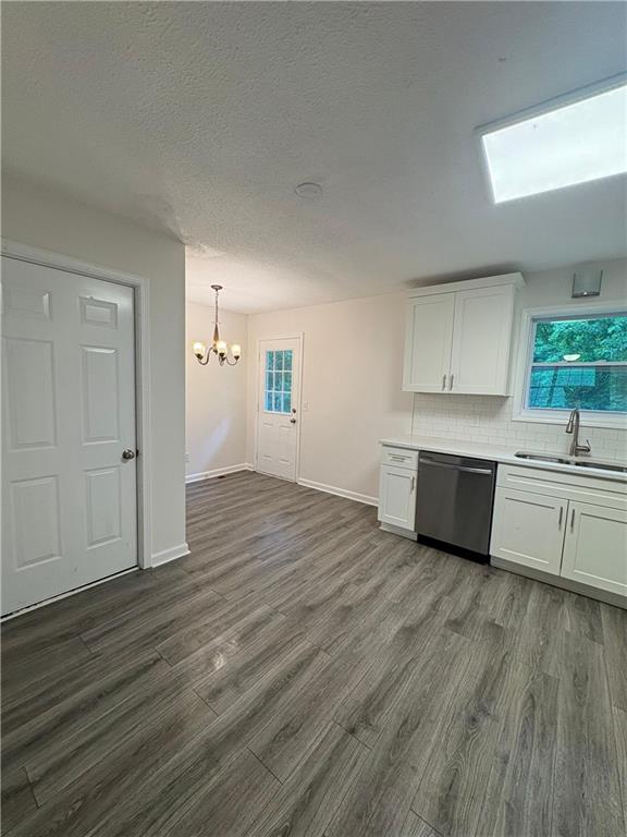 643 Akins Road Chickamauga, GA 30707 - Photo 6 of 14 a view of a kitchen with wooden floor and a sink