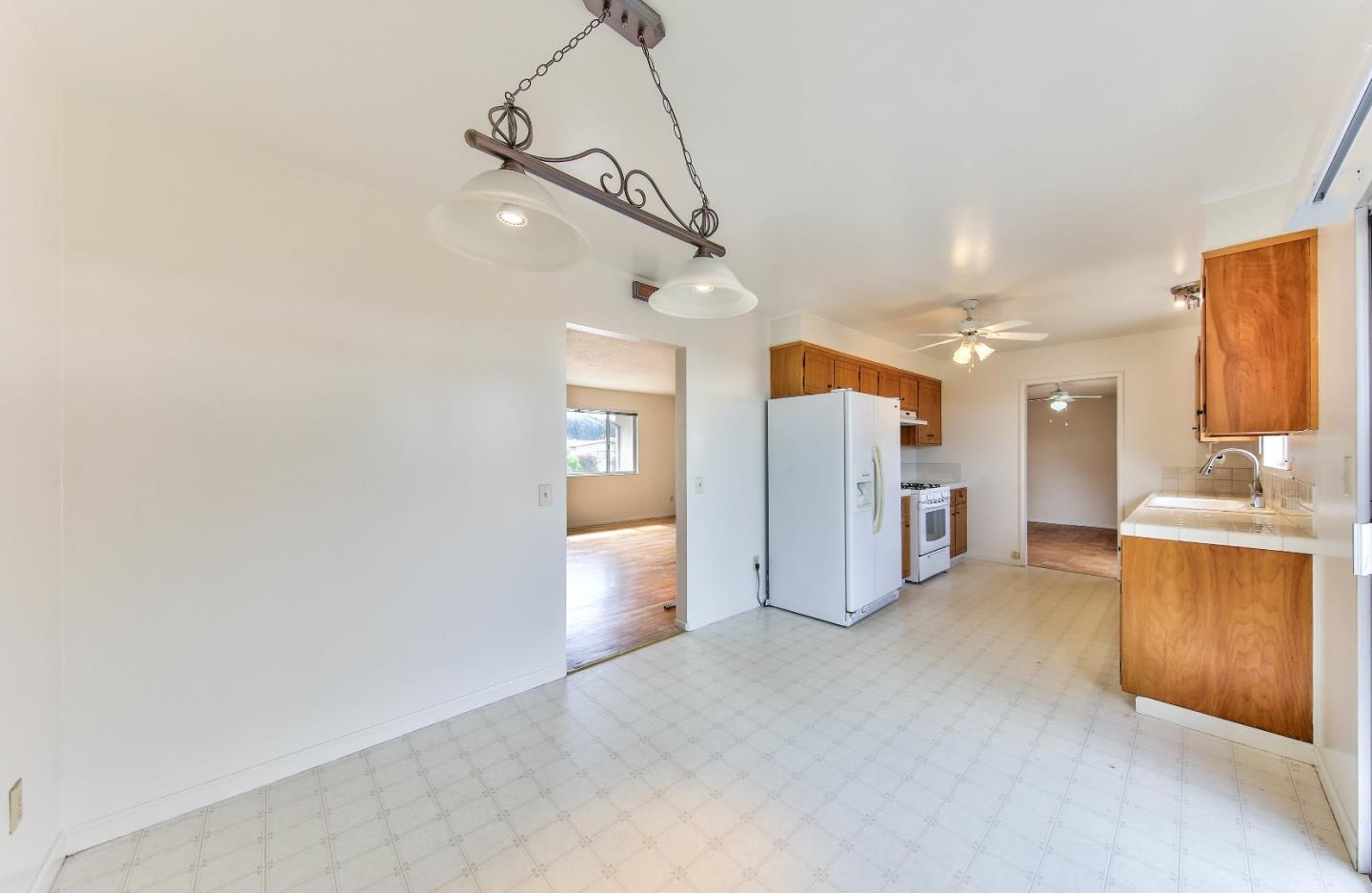 3283 Michael Drive Marina, CA 93933 - Photo 6 of 19 a view of a kitchen with a sink and cabinets