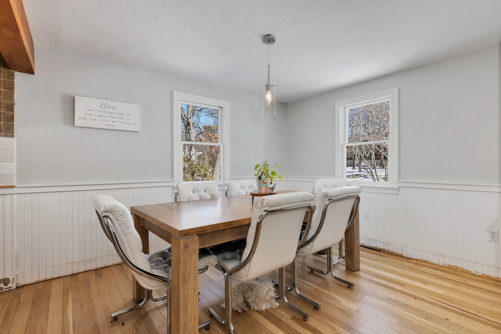 42 Forest Drive Mashpee, MA 02649 - Photo 1 of 55 a view of a dining room with furniture window and wooden floor