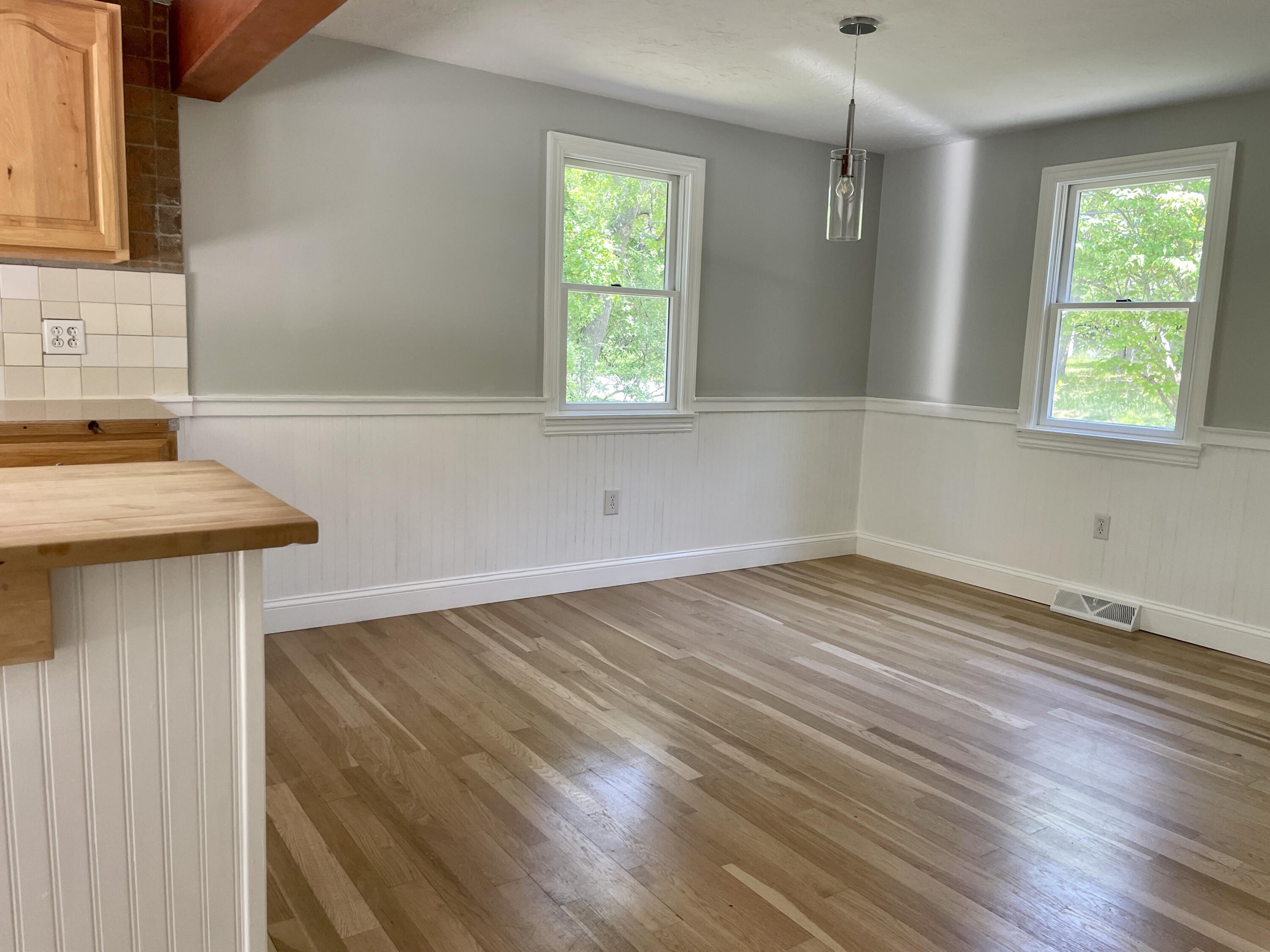 42 Forest Drive Mashpee, MA 02649 - Photo 2 of 55 a view of a room with wooden floor and windows