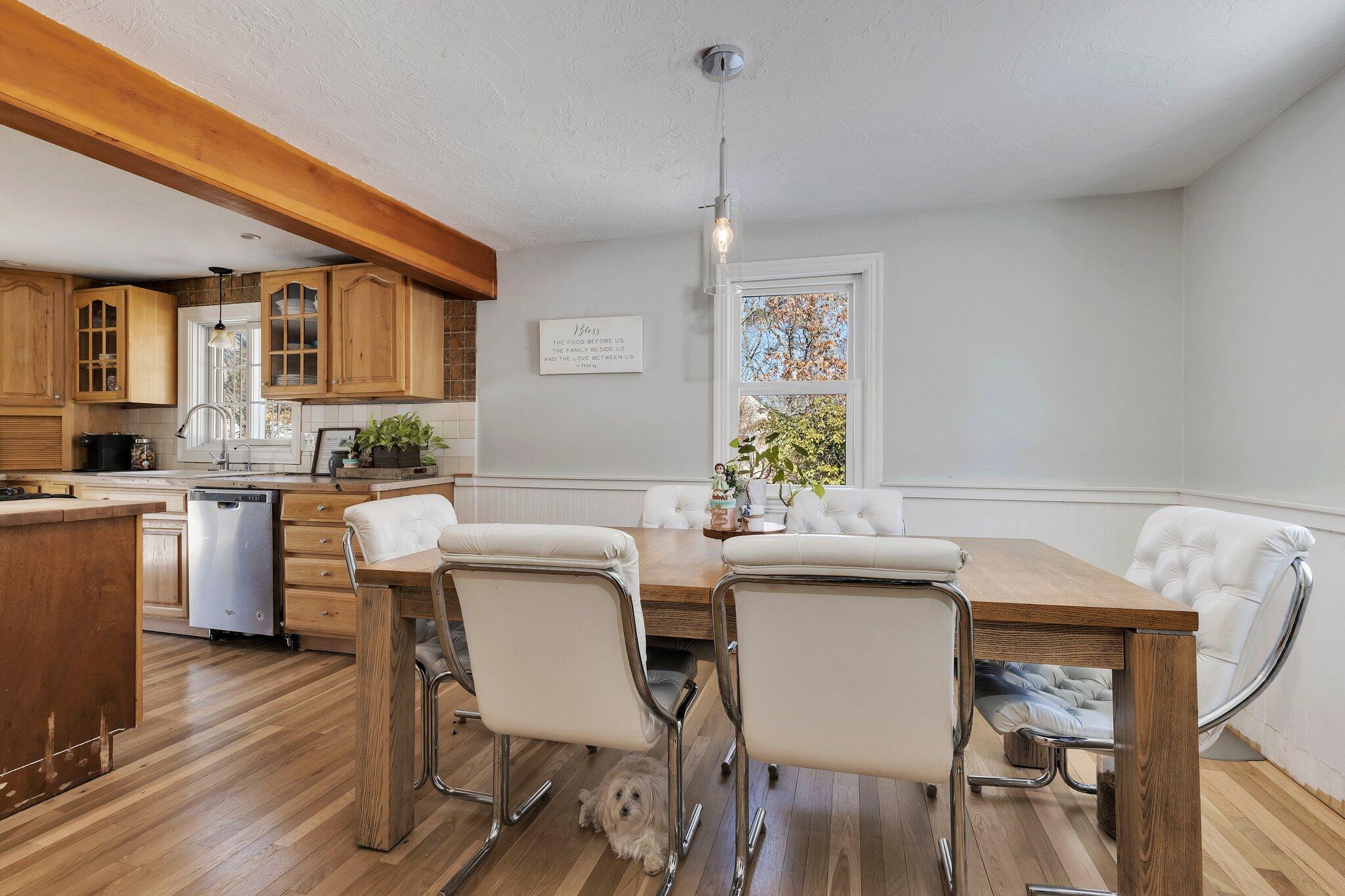 42 Forest Drive Mashpee, MA 02649 - Photo 3 of 55 a view of a dining room with furniture and wooden floor