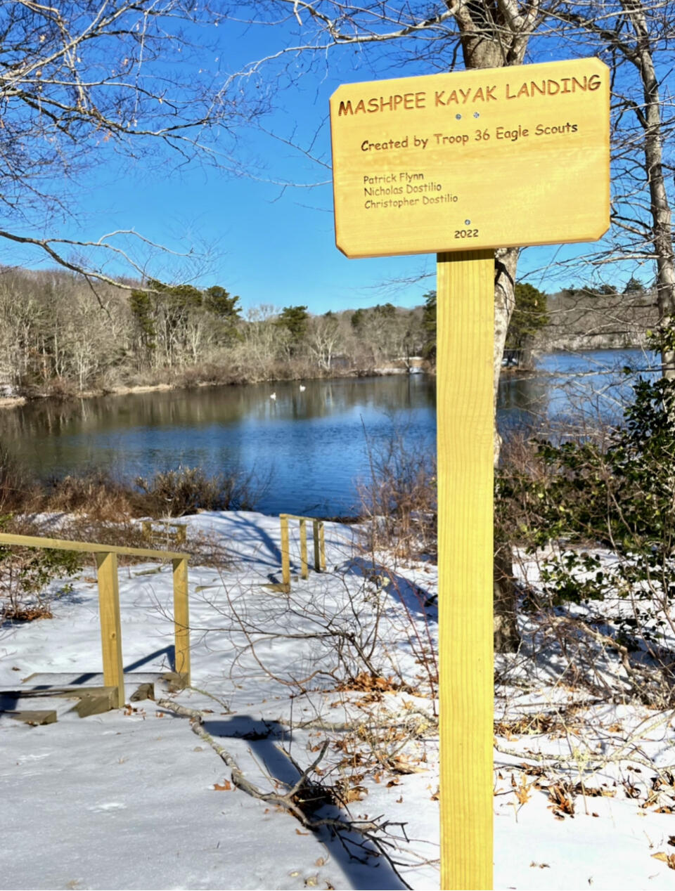 42 Forest Drive Mashpee, MA 02649 - Photo 51 of 55 a sign on the side of a building