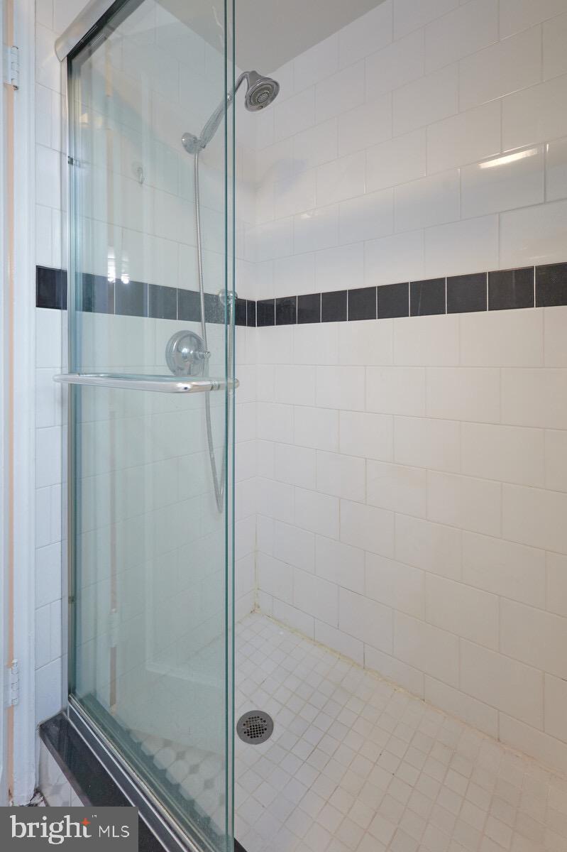 2215 Washington Avenue, Unit 103 Silver Spring, MD 20910 - Photo 15 of 26 a bathroom with a shower
