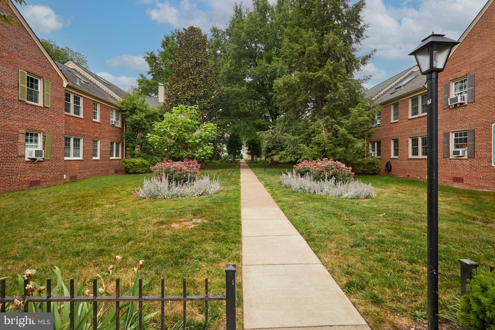 2215 Washington Avenue, Unit 103 Silver Spring, MD 20910 - Photo 18 of 26 a view of a swimming pool with a patio
