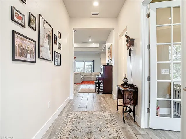 a view of a hallway with a workspace