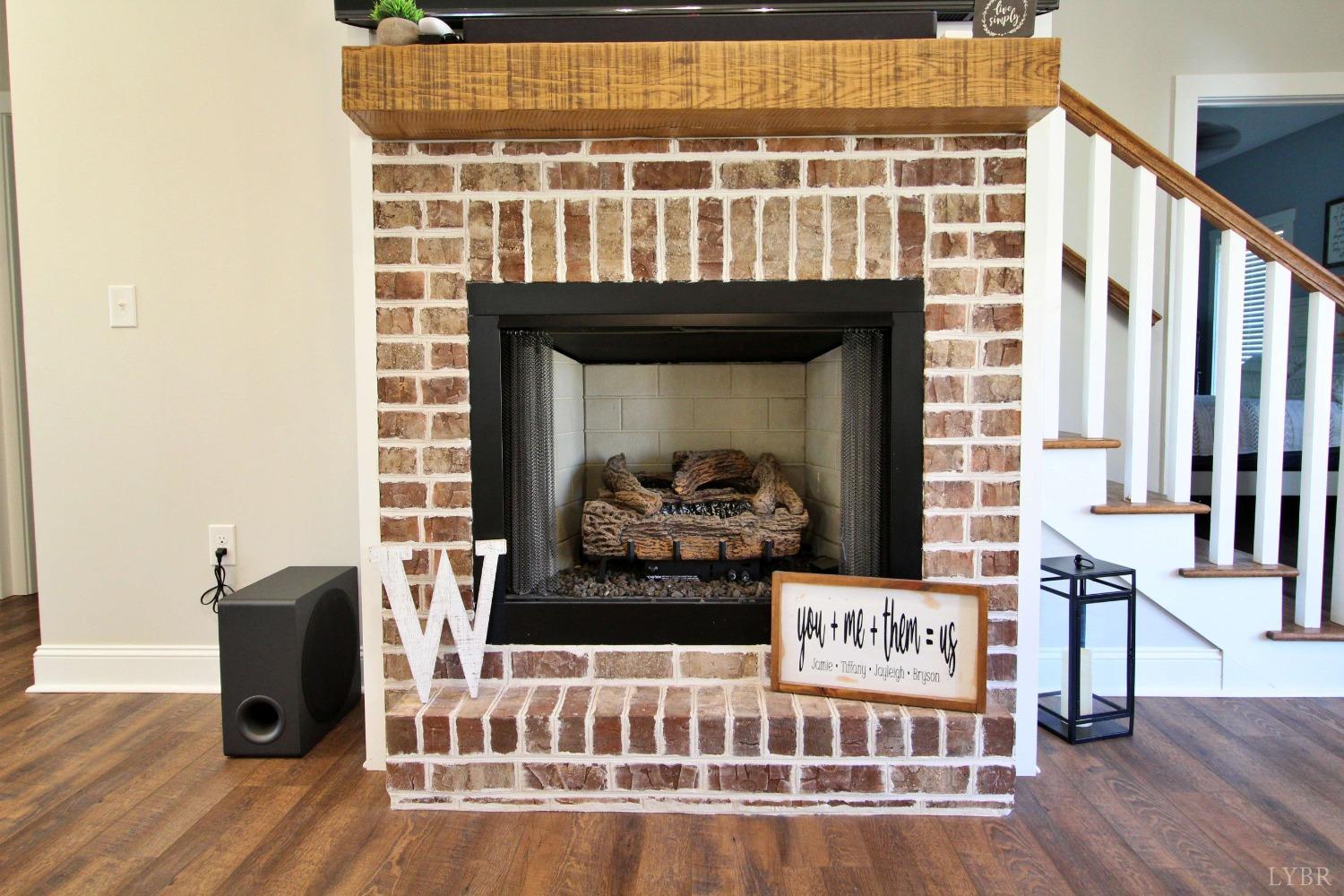 45 Langdon Road Evington, VA 24550 - Photo 16 of 74 a living room with furniture and a fireplace