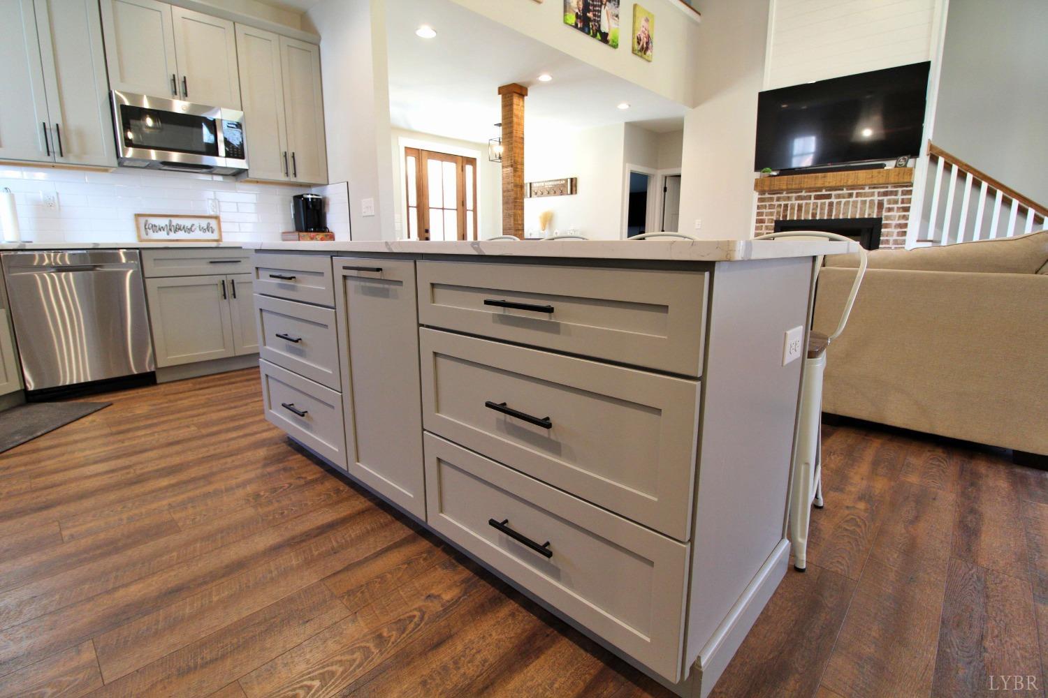 45 Langdon Road Evington, VA 24550 - Photo 20 of 74 a kitchen with stainless steel appliances cabinets and a flat screen tv
