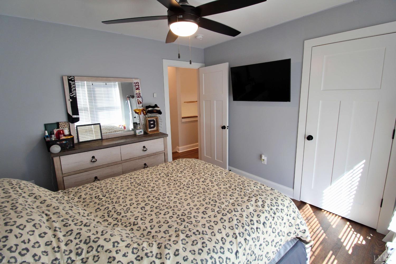 45 Langdon Road Evington, VA 24550 - Photo 59 of 74 a bedroom with a bed and a flat screen tv