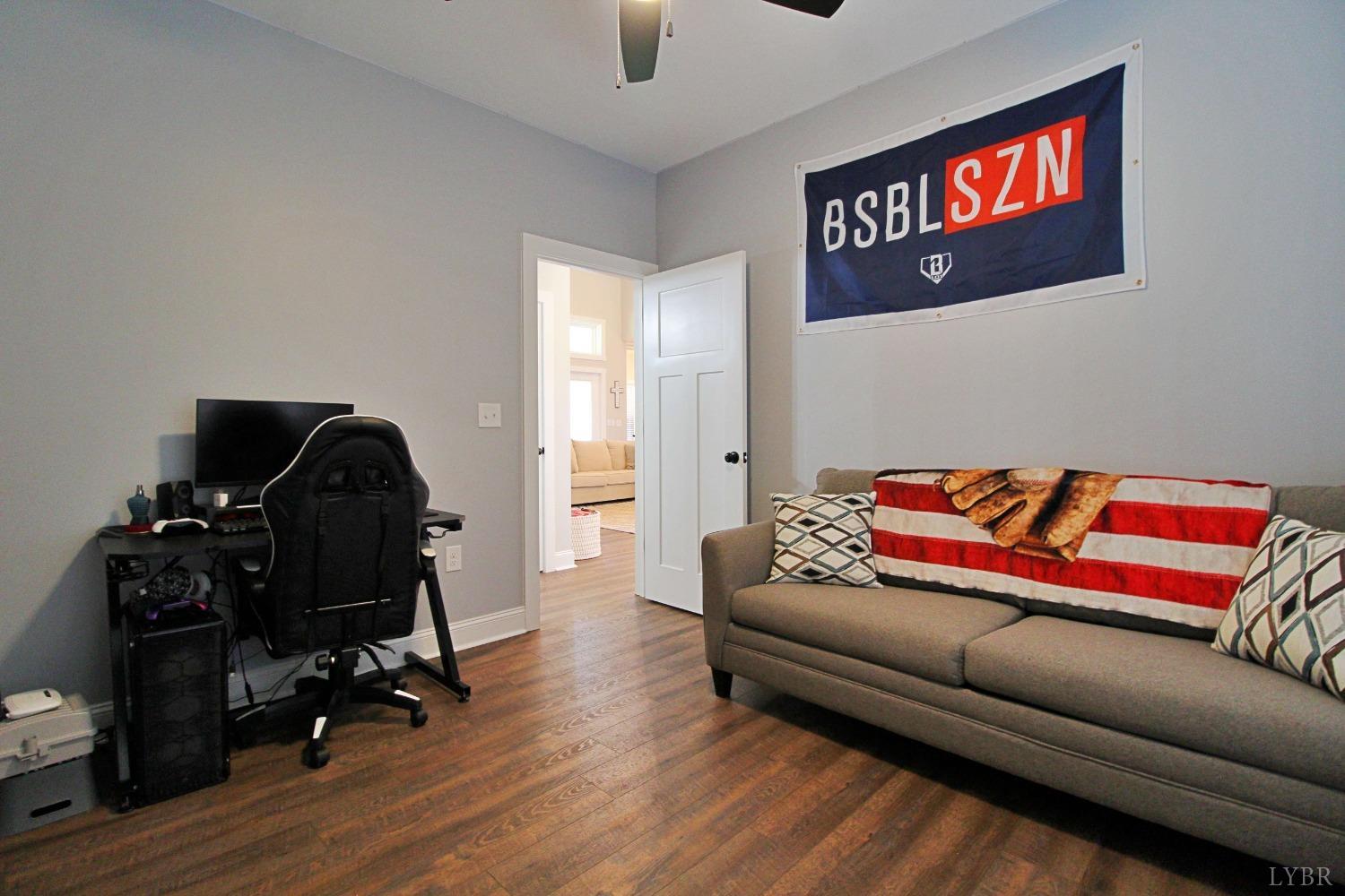 45 Langdon Road Evington, VA 24550 - Photo 66 of 74 a living room with furniture and wooden floor