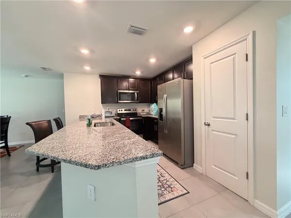 a view of a bathroom from the hallway
