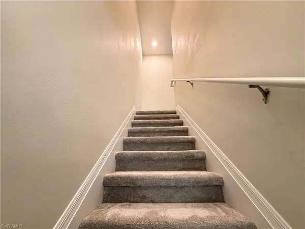 a kitchen with a refrigerator a sink and a refrigerator