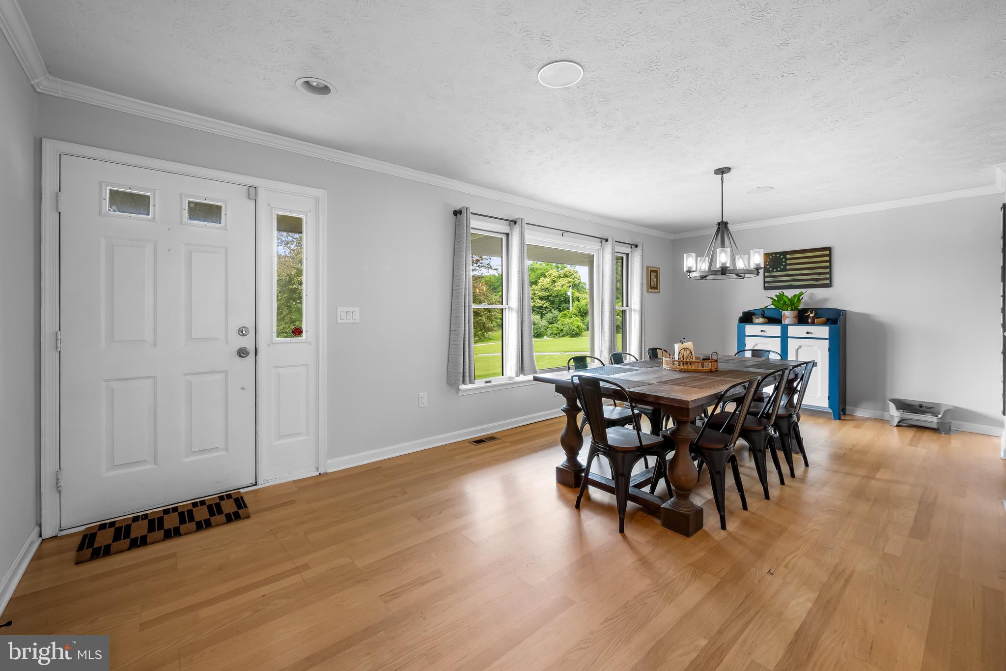 2997 Patapsco Road Finksburg, MD 21048 - Photo 3 of 50 a view of a dining room with furniture window and wooden floor