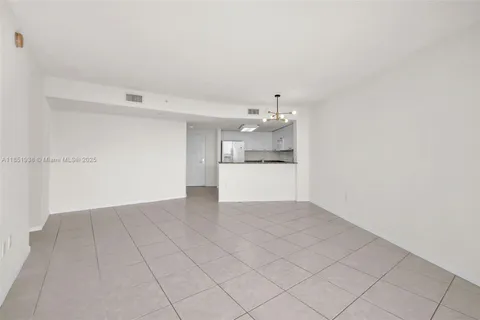 a view of a kitchen with wooden cabinet and fireplace