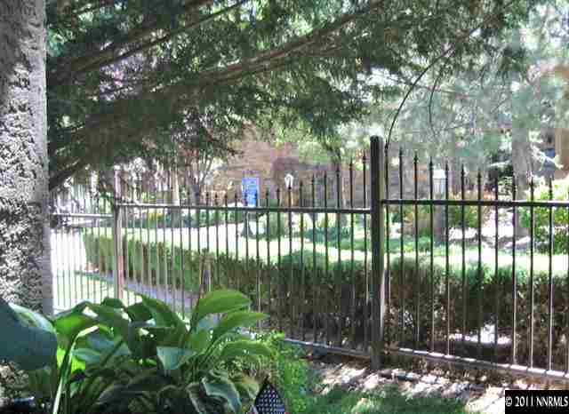 900 S Meadows, Unit 111 Reno, NV 89521 - Photo 1 of 1 a view of a wrought iron fence