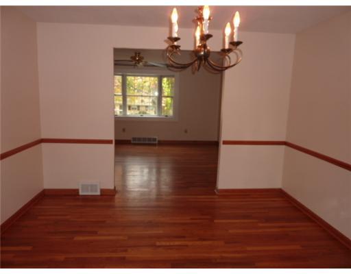 242 Lytton Road Coraopolis, PA 15108 - Photo 6 of 18 Dining Room. Beautiful hardwood floor and chair rail highlight this dining room. There is a bay window in the far living room.
