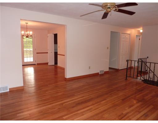 242 Lytton Road Coraopolis, PA 15108 - Photo 8 of 18 Living Room. This view of the main floor shows the freshly painted neutral walls and flooring throughout this home.