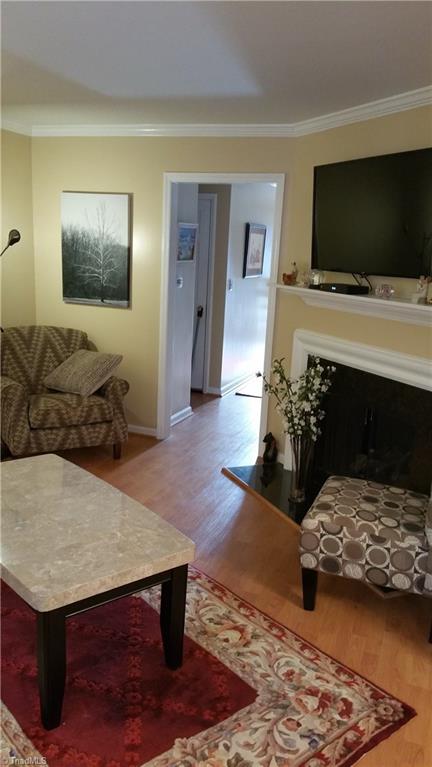 3419 Polo Road, Unit 4 Winston-Salem, NC 27106 - Photo 4 of 17 Living Room with gas fireplace