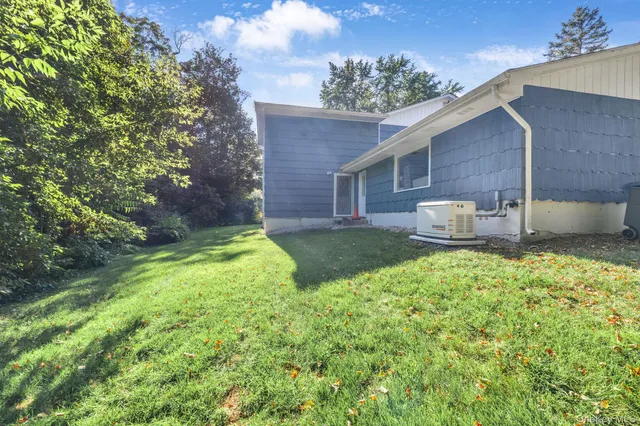 a house view with a garden space