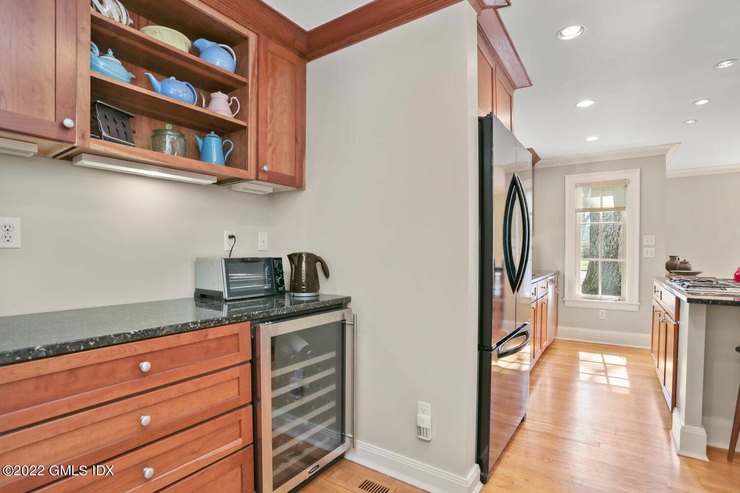 7 Owenoke Way Riverside, CT 06878 - Photo 12 of 37 a kitchen with stainless steel appliances granite countertop a refrigerator and a sink