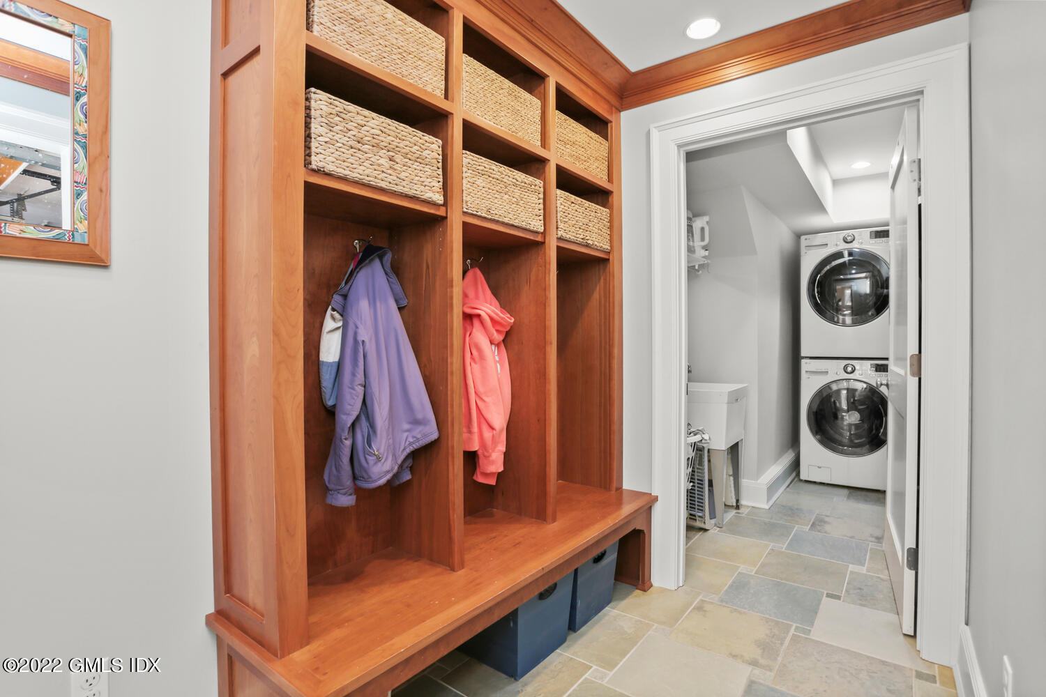 7 Owenoke Way Riverside, CT 06878 - Photo 13 of 37 a view of a bedroom with washer and dryer