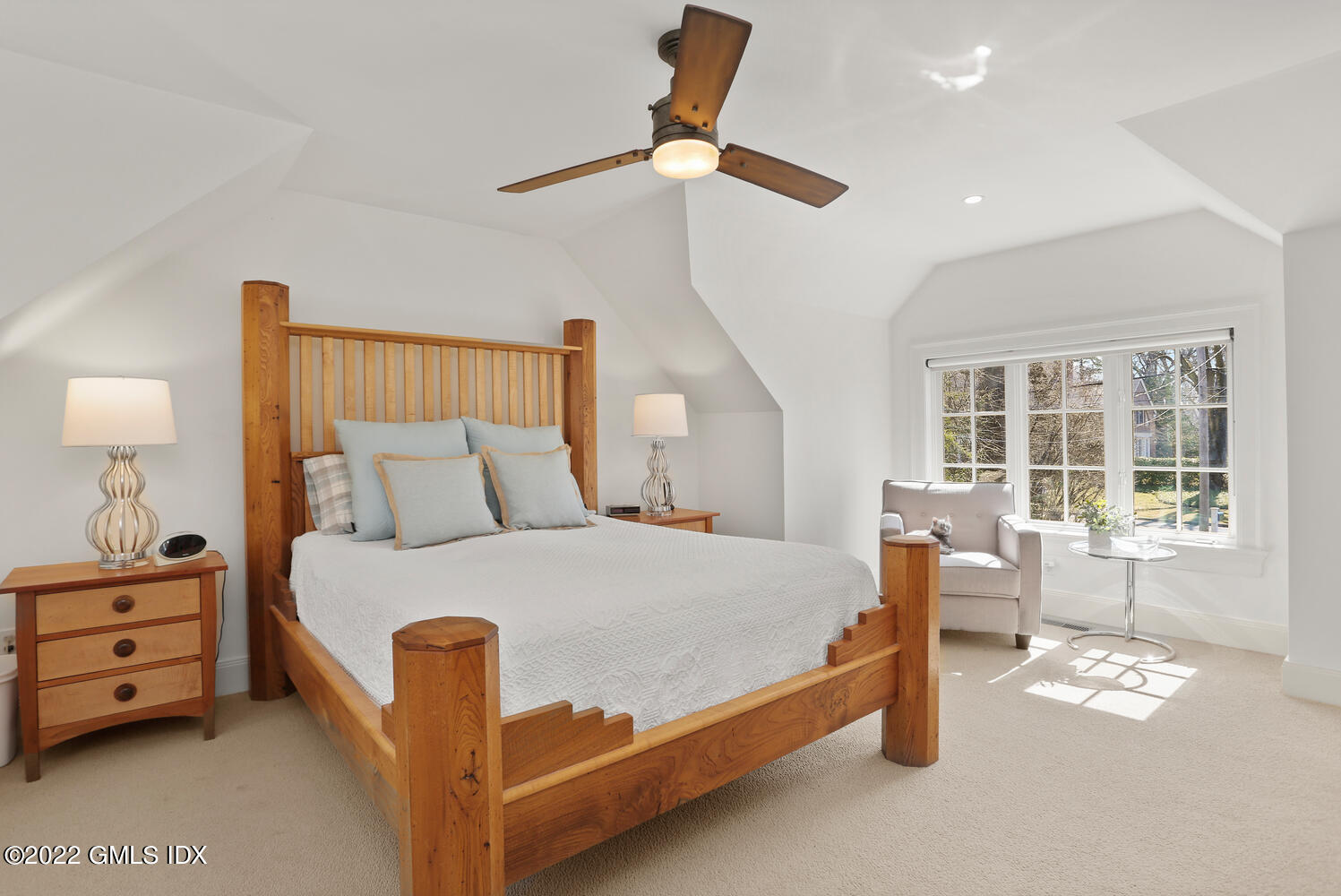 7 Owenoke Way Riverside, CT 06878 - Photo 18 of 37 a bed room with a bed and a window