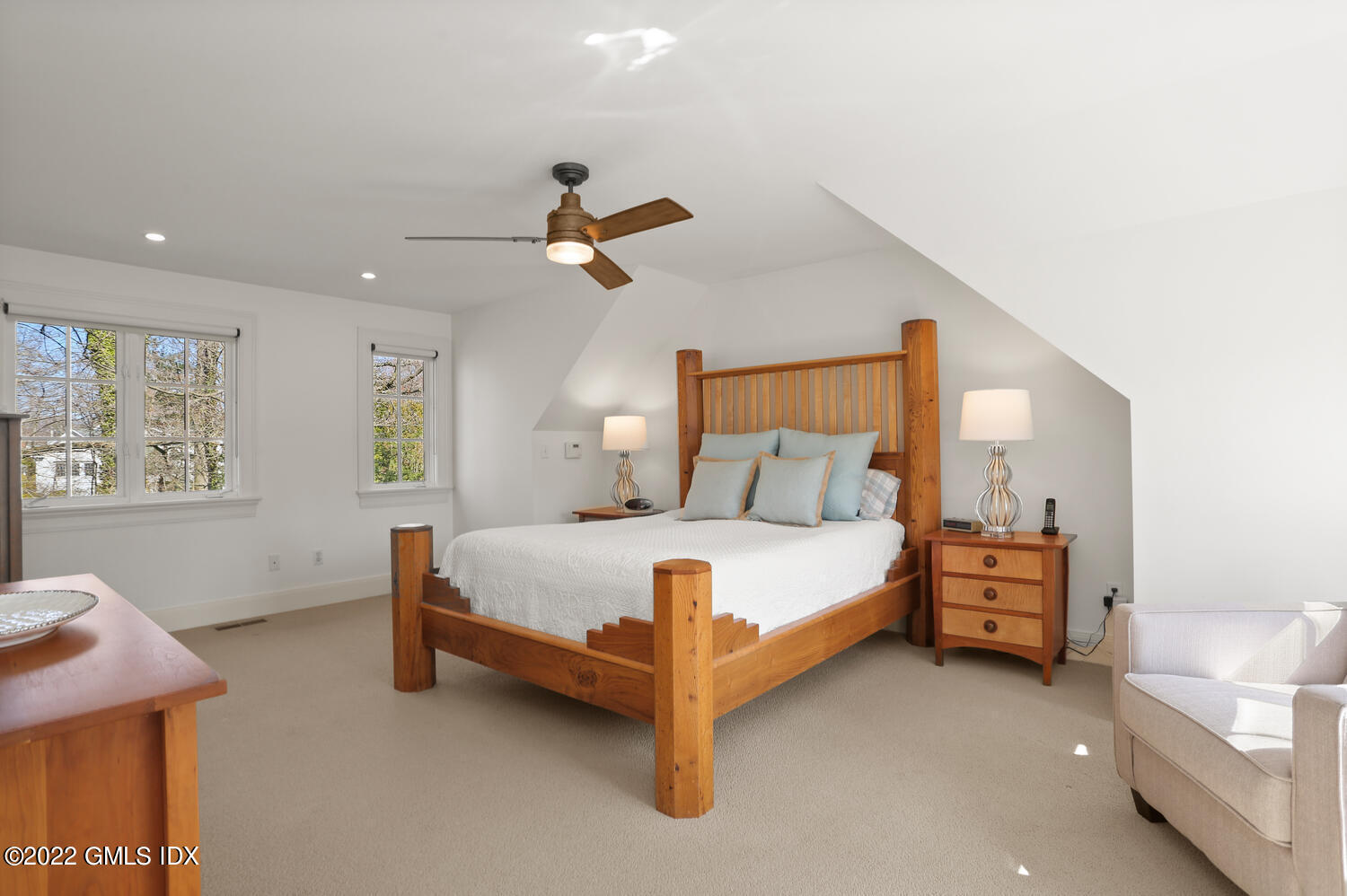 7 Owenoke Way Riverside, CT 06878 - Photo 19 of 37 a bedroom with a bed and furniture