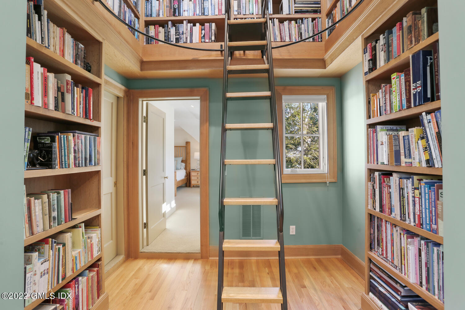 7 Owenoke Way Riverside, CT 06878 - Photo 25 of 37 a view of living room and wooden floor