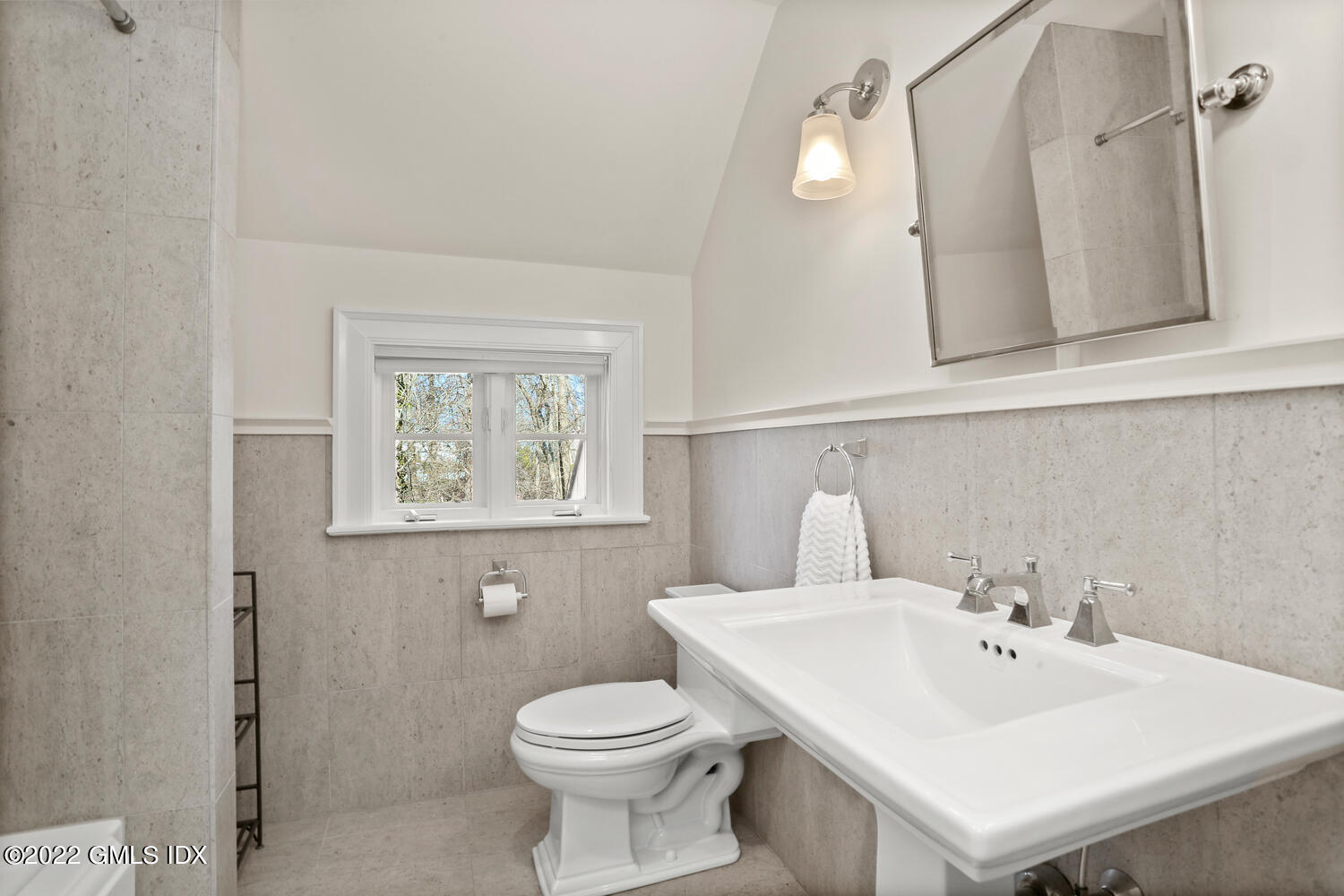 7 Owenoke Way Riverside, CT 06878 - Photo 30 of 37 a bathroom with a sink a toilet and mirror