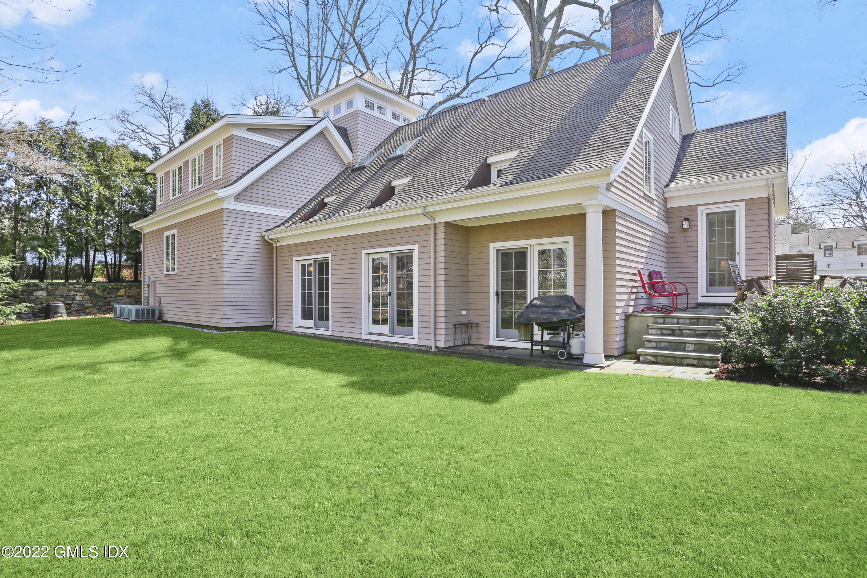 7 Owenoke Way Riverside, CT 06878 - Photo 33 of 37 a front view of house with yard and green space
