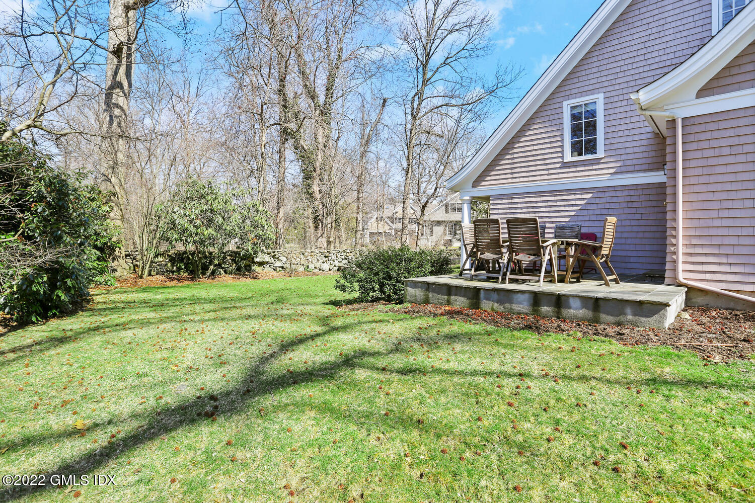 7 Owenoke Way Riverside, CT 06878 - Photo 35 of 37 a view of a house with backyard and sitting area