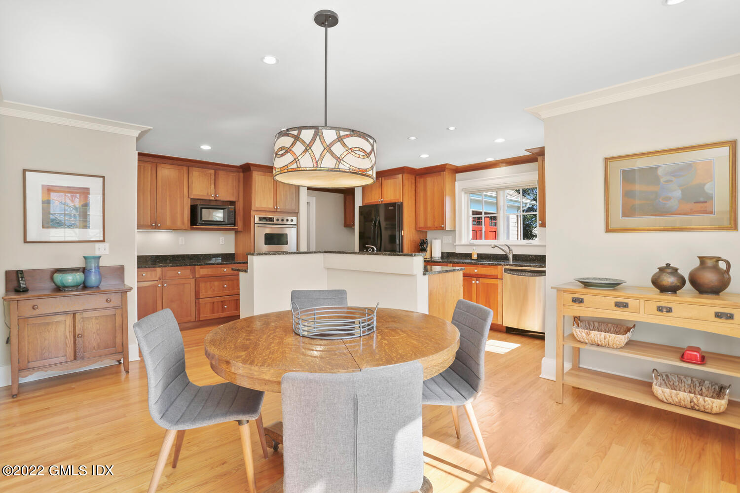 7 Owenoke Way Riverside, CT 06878 - Photo 7 of 37 a view of a dining room with furniture and wooden floor