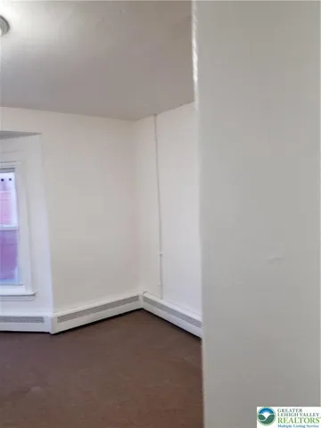 a view of hallway with closet