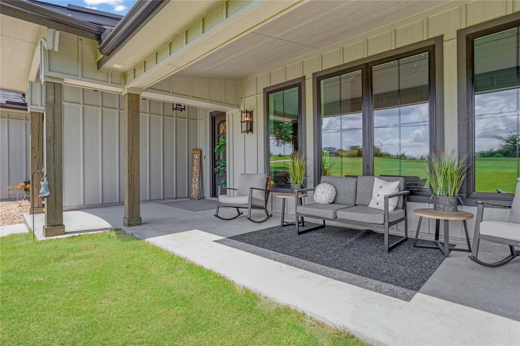 1095 Sister Grove Road Van Alstyne, TX 75495 - Photo 2 of 35 The front porch is inviting and spacious!